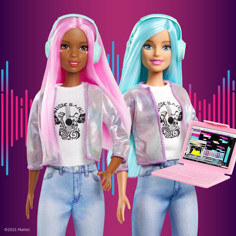 Music producer Barbies stand side-by-side with their next hit in progress on their laptop.