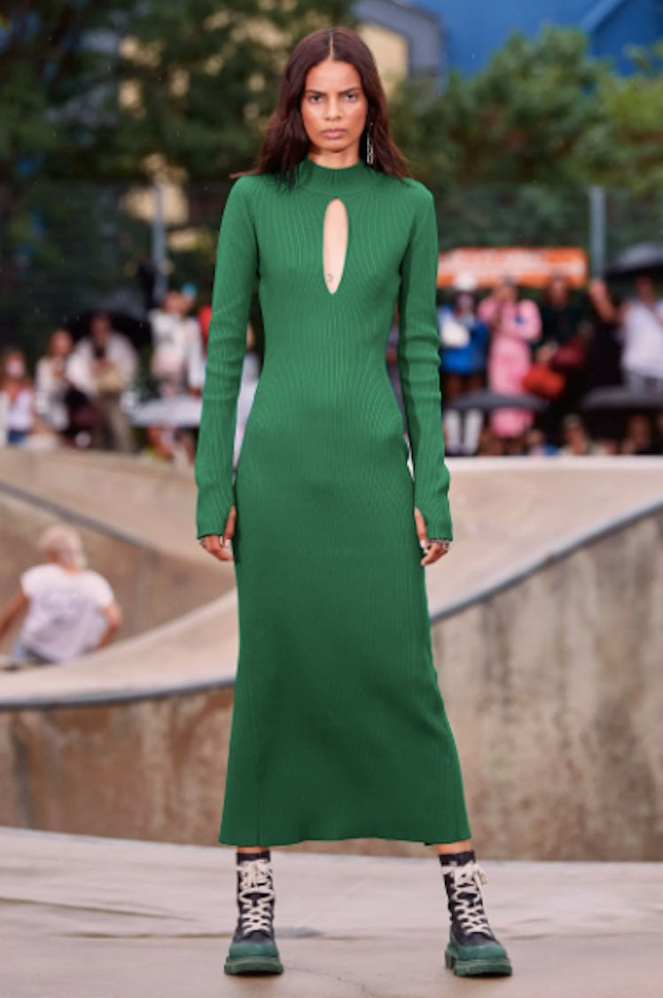 A model wearing a green Monse dress during the NYFW Spring 2022