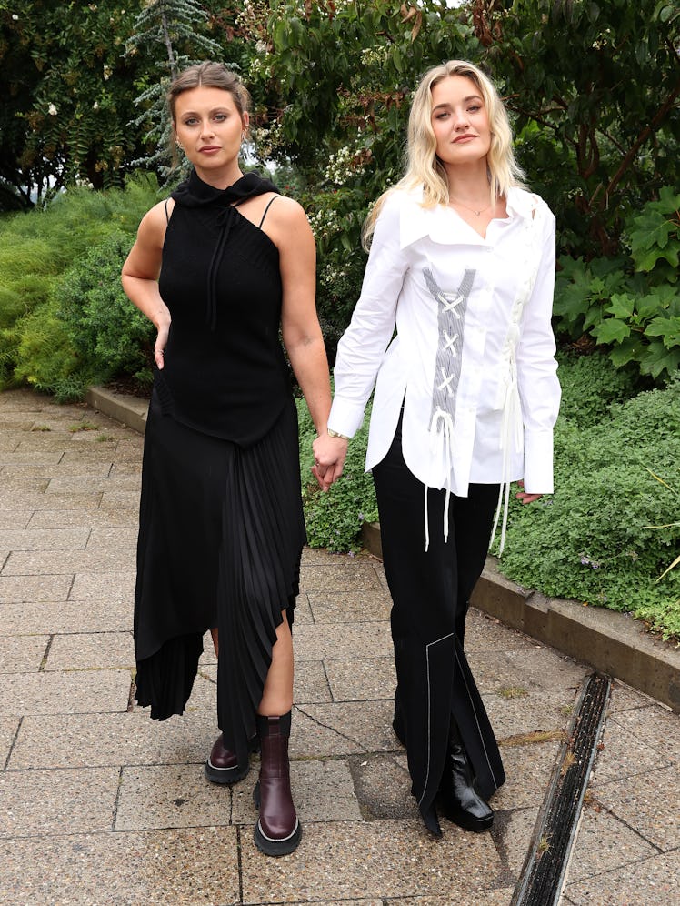  Aly Michalka (L) and AJ Michalka of Aly & AJ attend the front row for Monse Resort 22 during NYFW: ...