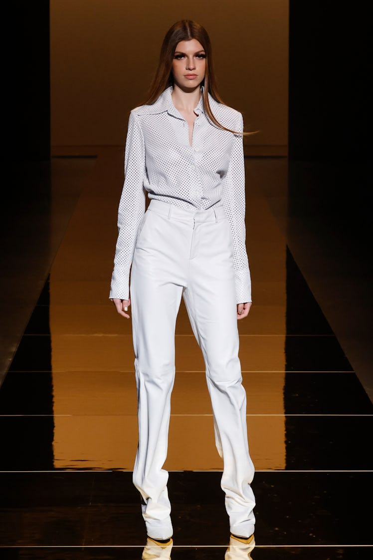 A model wearing a white jumpsuit by Sergio Hudson during the NYFW Spring 2022