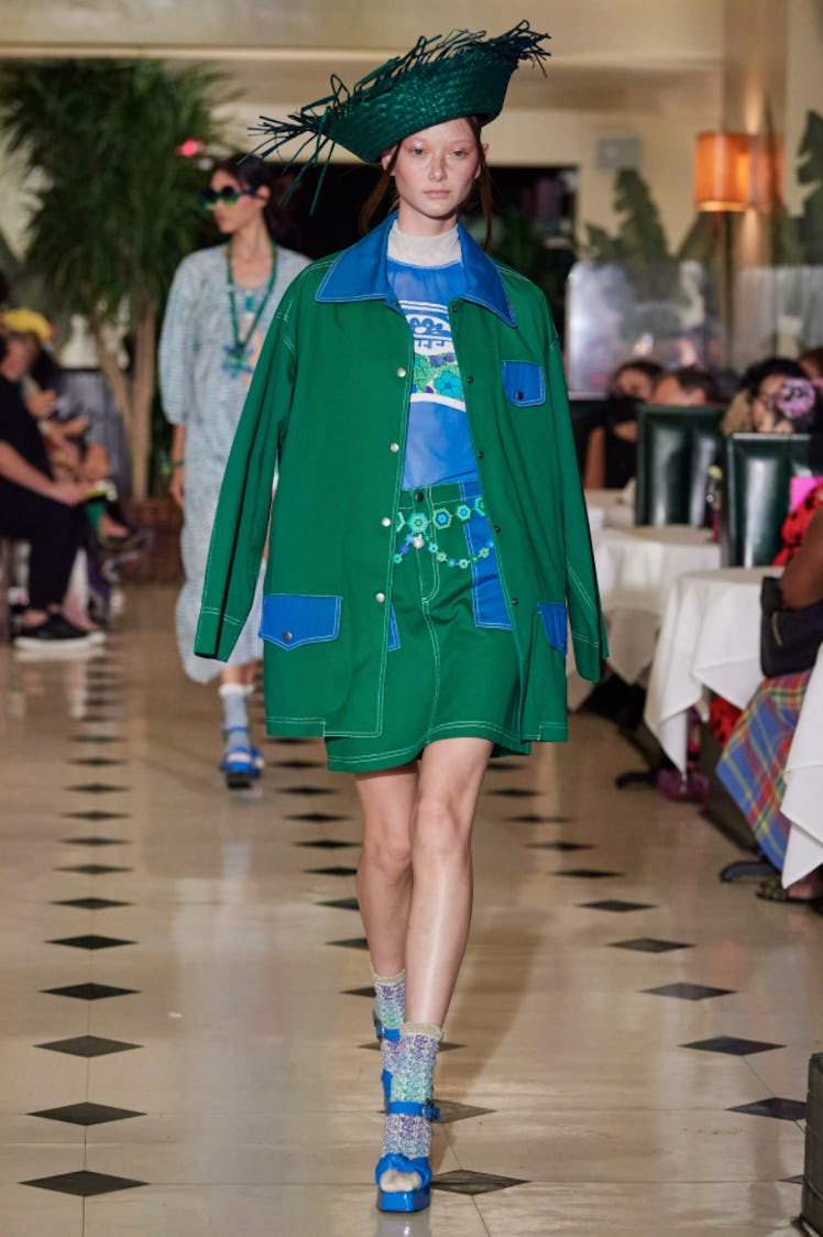 A model wearing a green-and-blue set by Anna Sui during New York Fashion Week Spring 2022