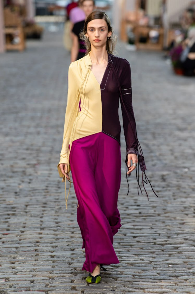 A model wearing a dress by Tory Burch during New York Fashion Week Spring 2022