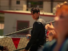 Noah Steinbuch playing Danny Zuko in Pepsi's commercial with Doja Cat.