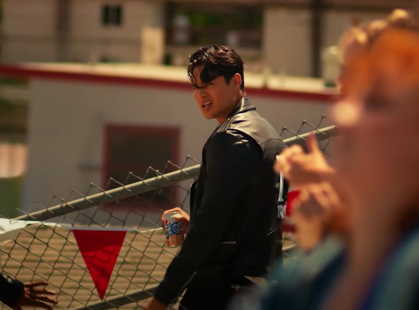 Noah Steinbuch playing Danny Zuko in Pepsi's commercial with Doja Cat.