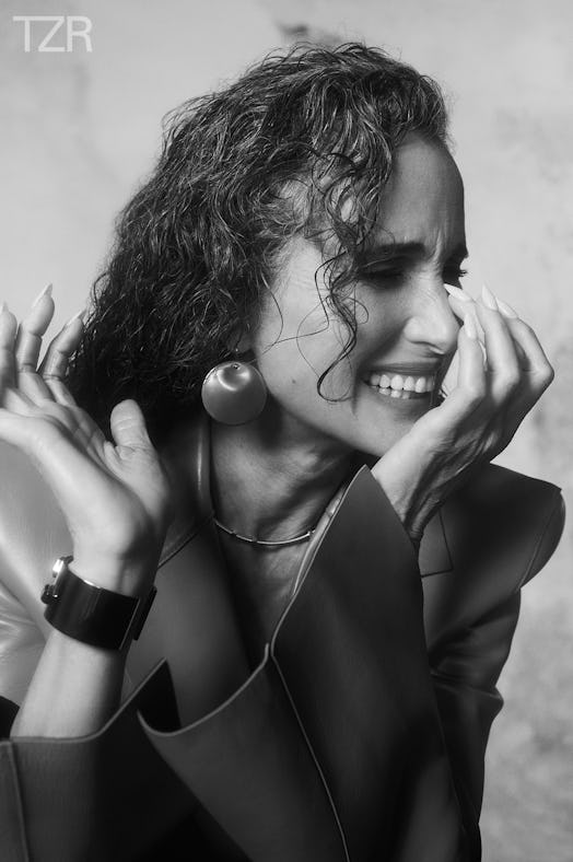 A black and white photo of Andie MacDowell wearing her hair in "wet" curls.