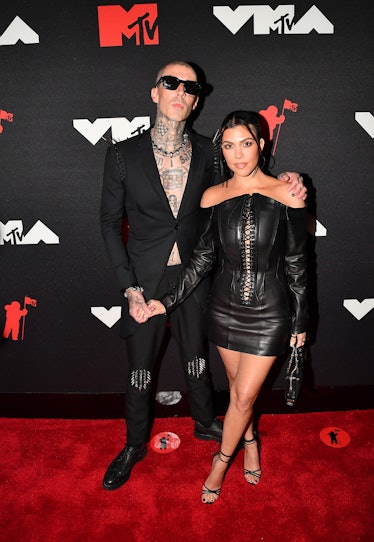 Travis Barker and Kourtney Kardashian attends the 2021 MTV Video Music Awards at Barclays Center on ...