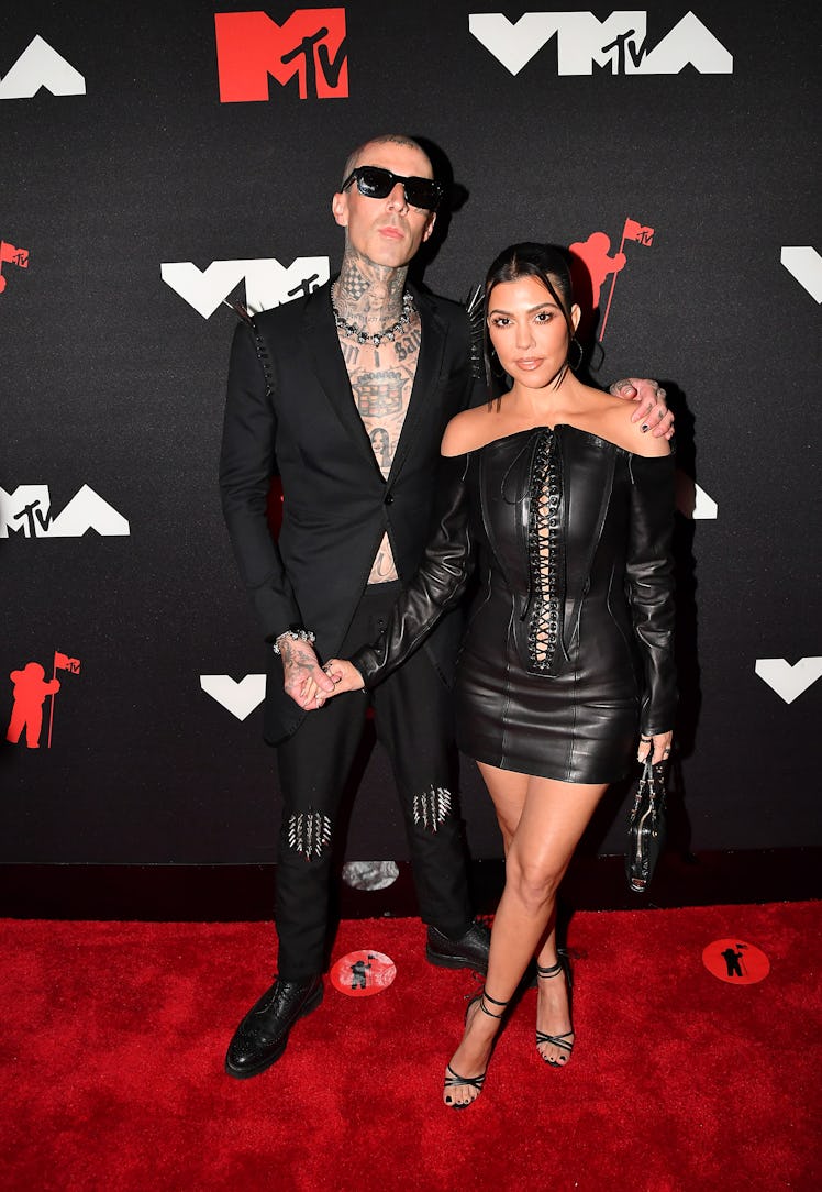 Travis Barker and Kourtney Kardashian attends the 2021 MTV Video Music Awards at Barclays Center on ...