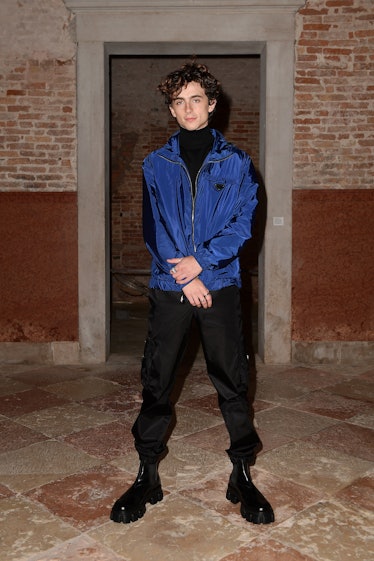 Timothee Chalamet in blue jacket.