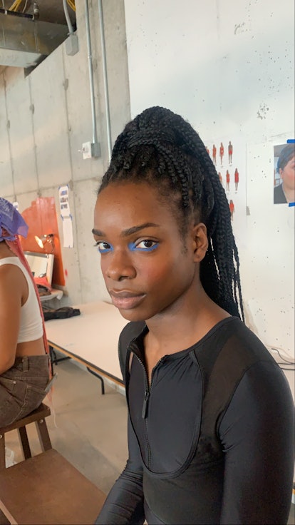 Graphic eyeliner, backstage at Chromat SS '22 show 