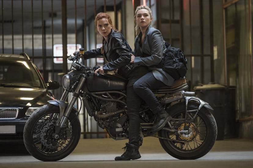 A still from 'Black Widow,' with Scarlett Johansson and Florence Pugh on top of a motorcycle.