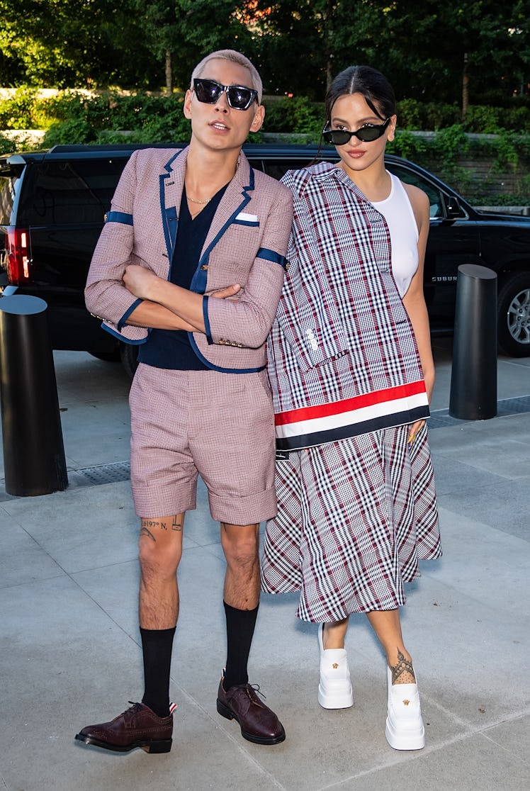  Evan Mock and Rosalía are seen arriving to the Thom Browne Spring 2022 Collection during New York F...