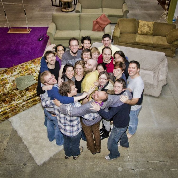 Group hug at the Couchsurfing office in San Francisco