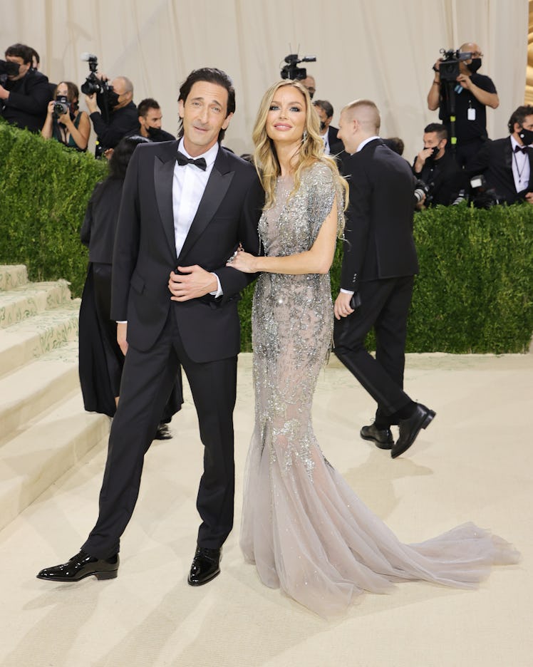 Adrien Brody and Georgina Chapman attend The 2021 Met Gala Celebrating In America: A Lexicon Of Fash...