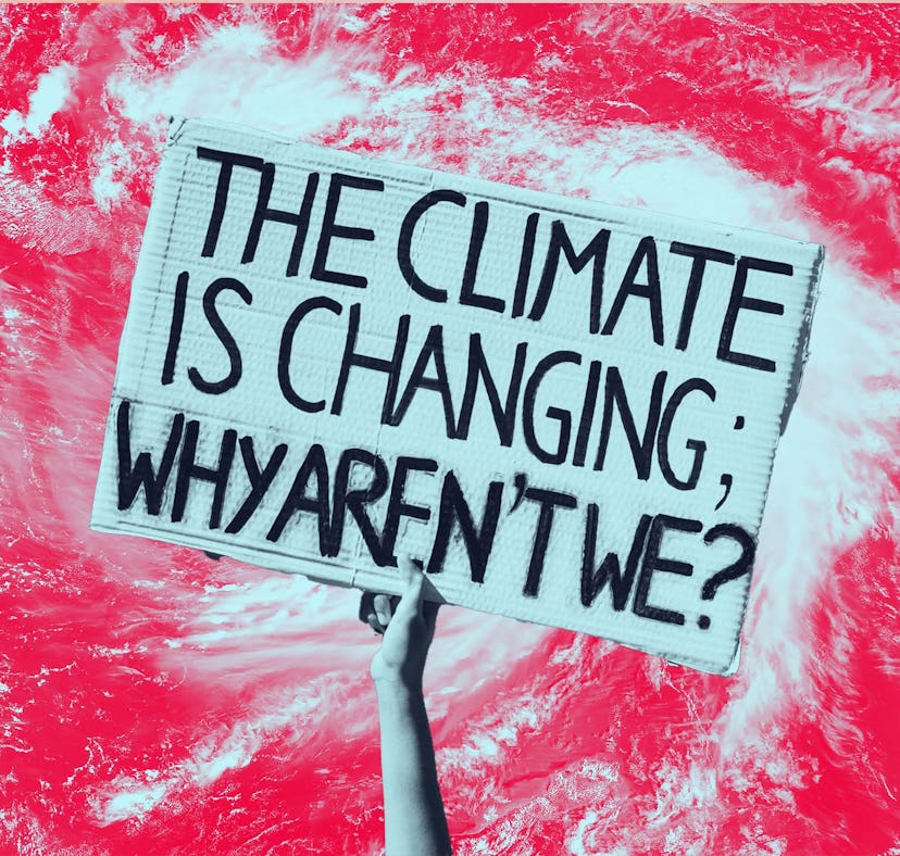 A hand holding a sign with the text "The climate is changing, why aren't we?"