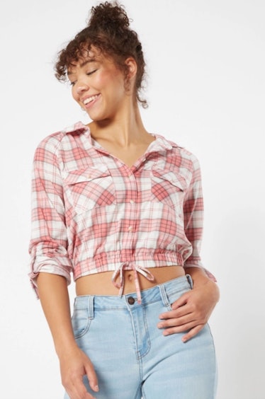 Carri from 'Sex and the City' wore a plaid crop top while dating Aidan.
