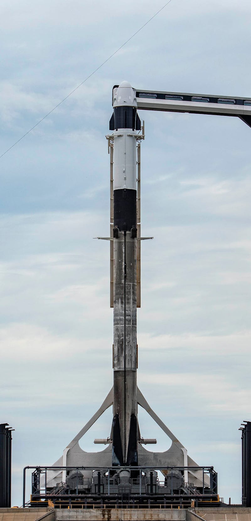 Falcon 9 rocket and Crew Dragon capsule on launchpad