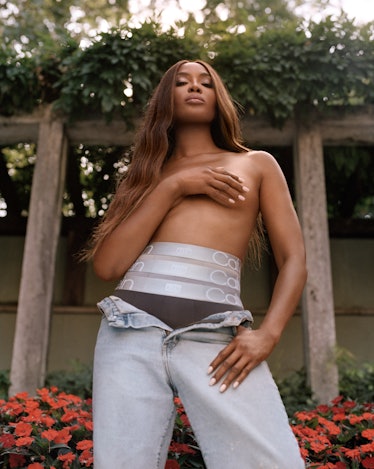 A topless Naomi Campbell in a Kith for Calvin Klein campaign