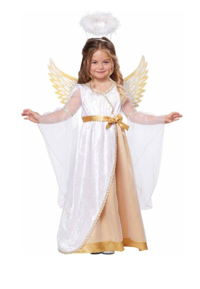 Little girl dressed in angel costume