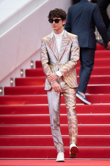 T. Chalamet in silver suit. 