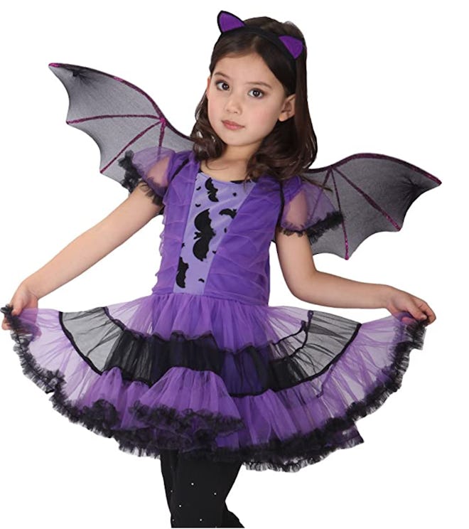 Little girl posing in Bat tutu dress/costume
