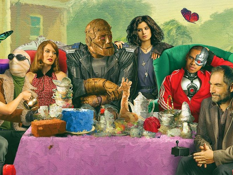 Painting of all members of Doom Patrol sitting at a table 