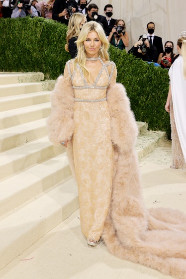Sienna Miller attends The 2021 Met Gala Celebrating In America: A Lexicon Of Fashion at Metropolitan...