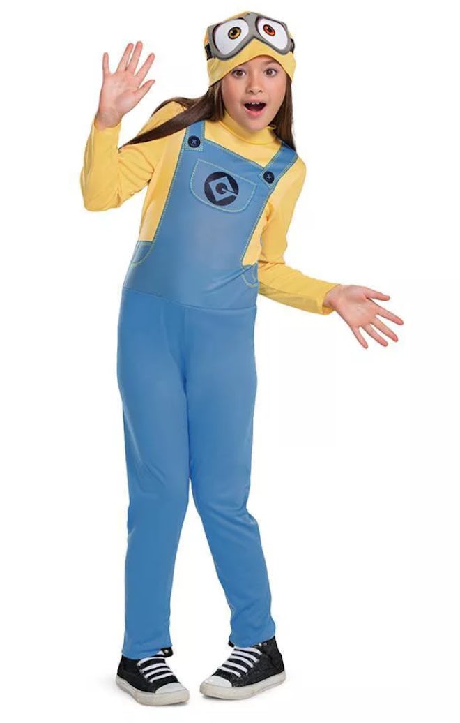 Young girl dressed in Minion costume