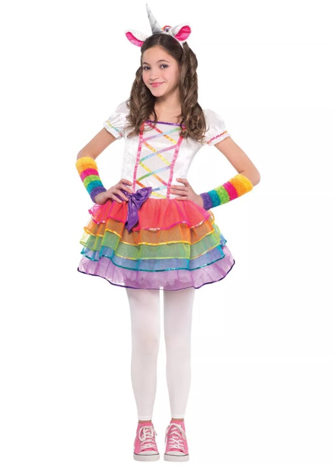 Little girl posing in unicorn tutu costume