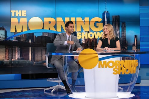 Hasan Minhaj and Reese Witherspoon in “The Morning Show” Season 2 via AppleTV+ press site.