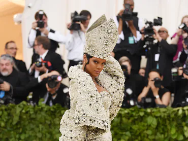 RIhanna dressed as pope.