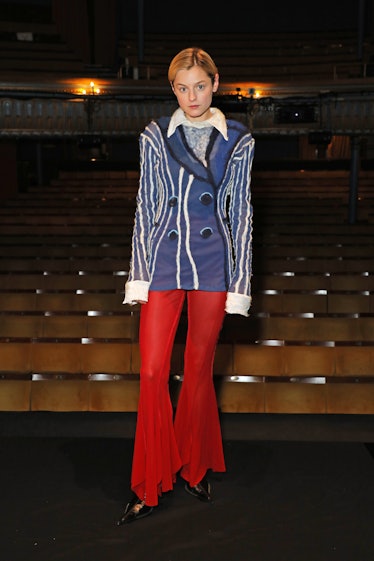 Emma Corrin poses on stage to celebrate the opening of "Anna X" at the Harold Pinter Theatre on July...