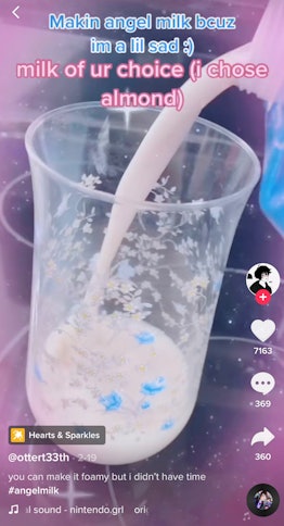 Pour milk into a glass to start making the viral angel milk on TikTok.