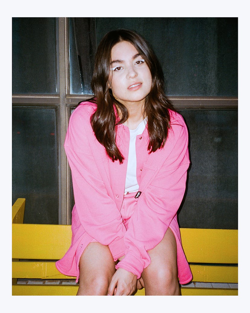 Devery Jacobs in a pink outfit