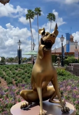 These pictures of Disney's 50th anniversary gold character statues are so cute.
