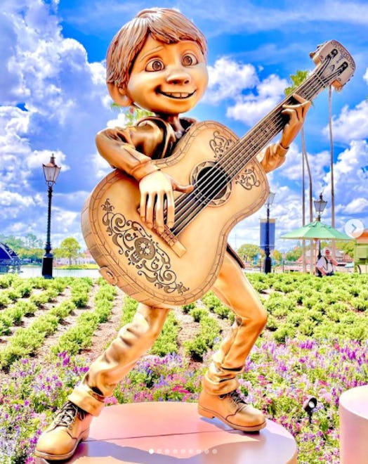These photos of Disney's 50th anniversary gold character statues include Miguel from 'Coco.'