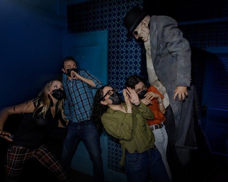 Guests get scared in 'The Haunting of Hill House' haunted house at Universal Studios' Halloween Horr...