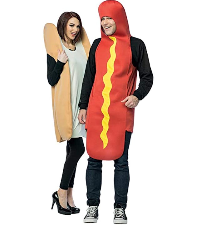 Woman dressed as bun and man dressed as hot dog