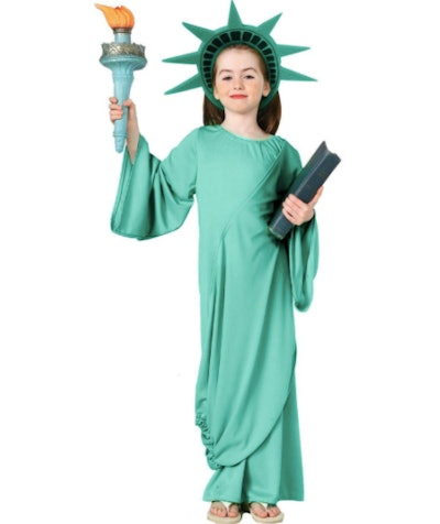 Girl dressed as the Statue of Liberty