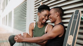 Young couple smiling at each other during the 2021 fall equinox, which will have a special emotional...