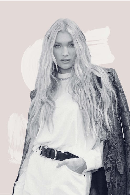 Supermodel & new mom Elsa Hosk posing in a white shirt