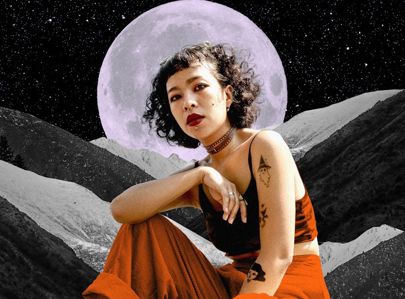 Young woman in front of a moon to show your October 2021 monthly horoscope.