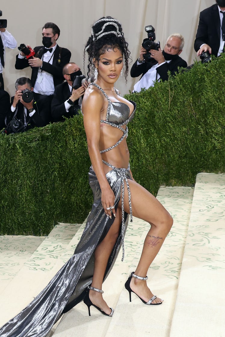 Teyana Taylor at the 2021 Met Gala benefit "In America: A Lexicon of Fashion" in a silver dress