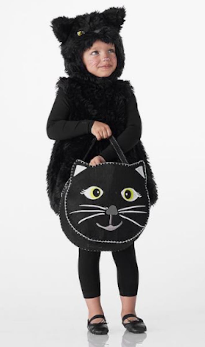 Girl wearing black cat costume