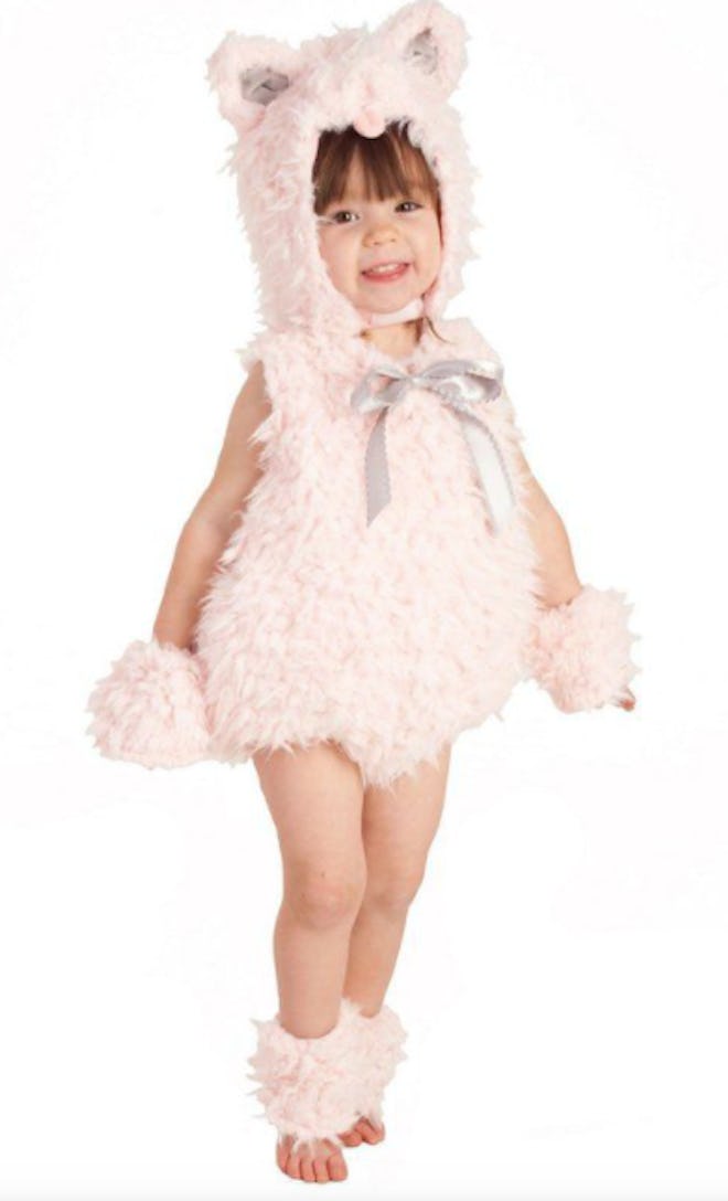 Child wearing a fluffy pink cat costume