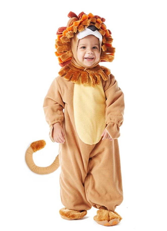 Toddler wearing lion costume