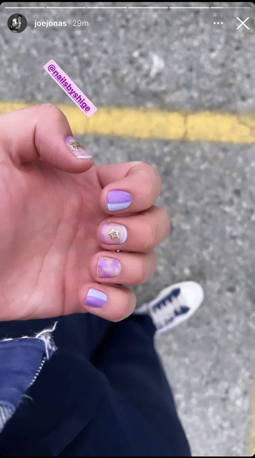 Joe Jonas' purple nail art made its Instagram debut, providing beauty lovers everywhere with Labor D...
