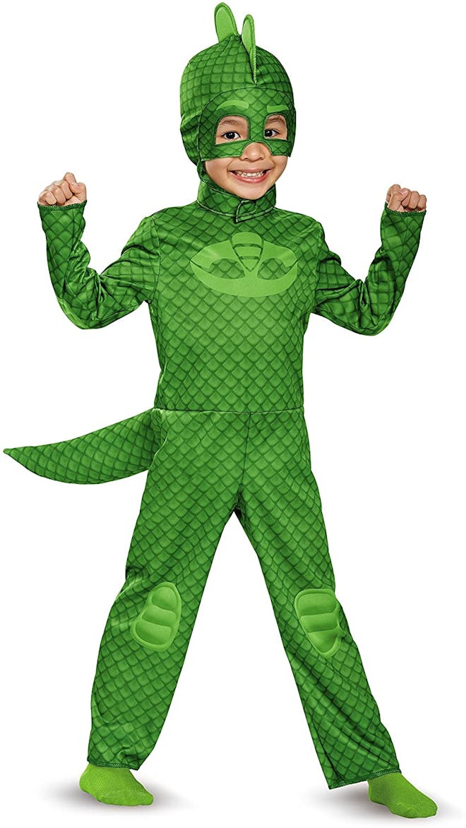 Toddler wearing green Gecko costume from "PJ Masks"