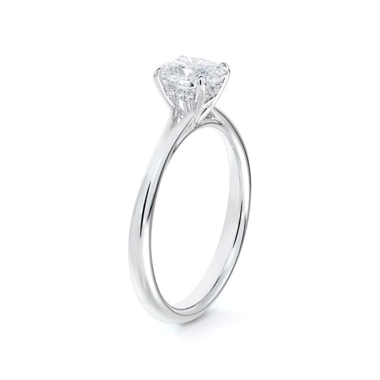 Forevermark Icon setting cushion engagement ring with diamond basket from De Beers Forevermark.