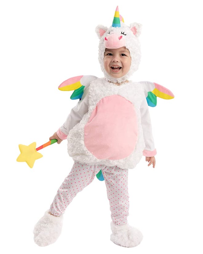 Toddler in hooded unicorn costume