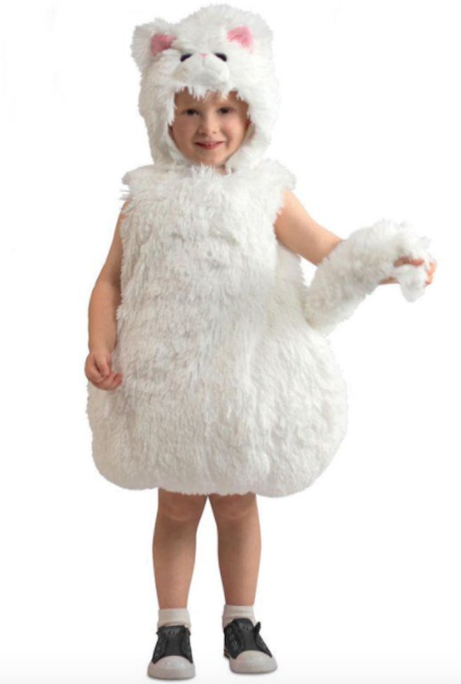 Child dressed in a fuzzy white cat costume